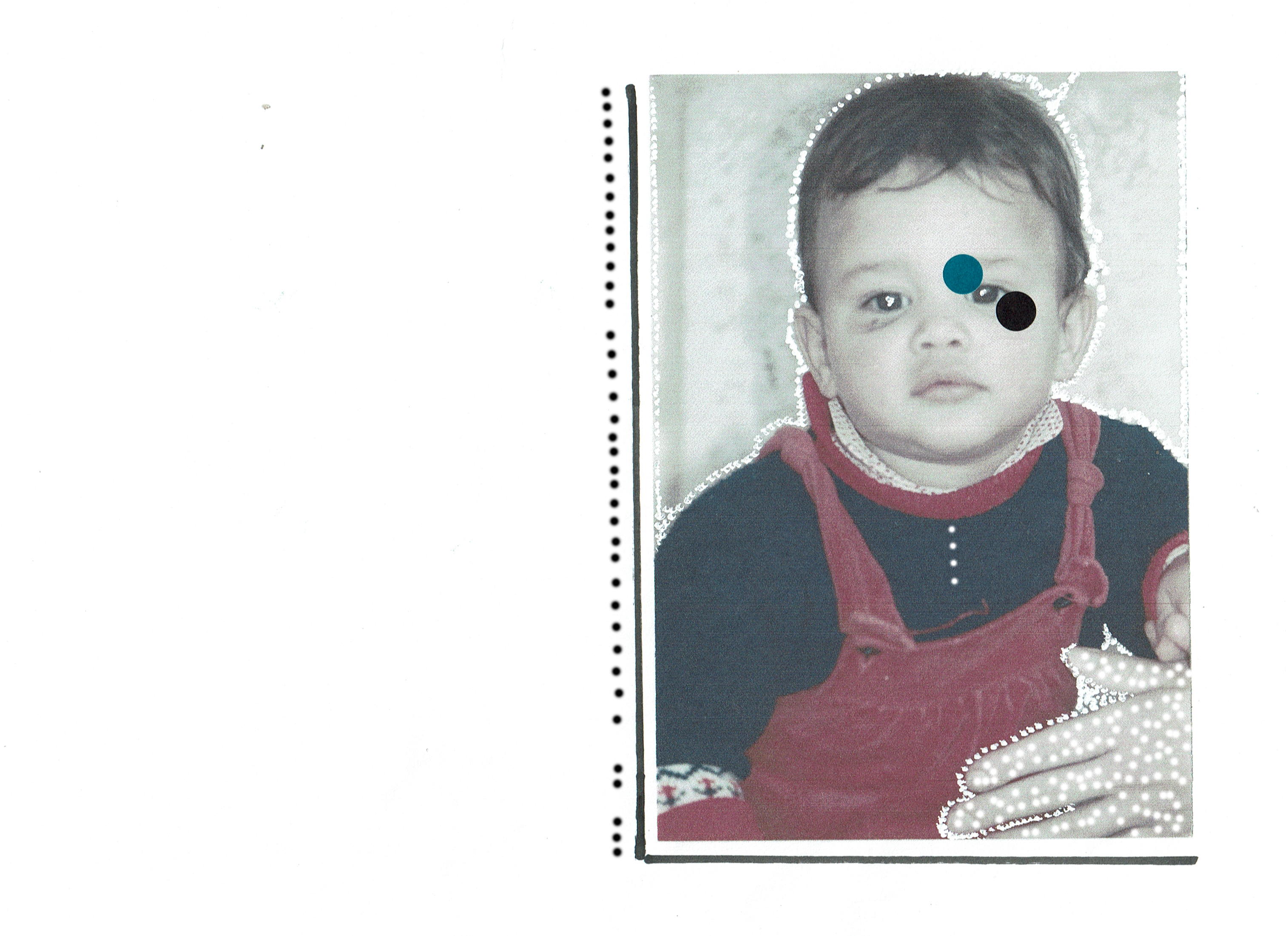 a decorated photograph of a baby. There are white dots drawn and black and blue paper cutouts